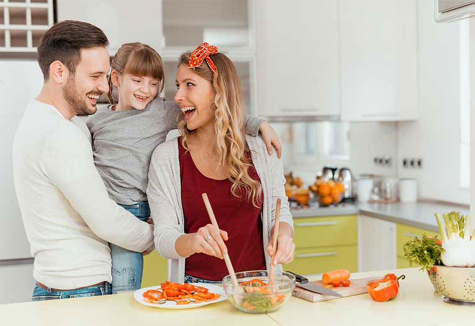 Happy Family With New Kitchen Design